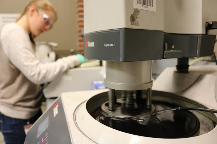 Sample Preparation Machine with worker in background